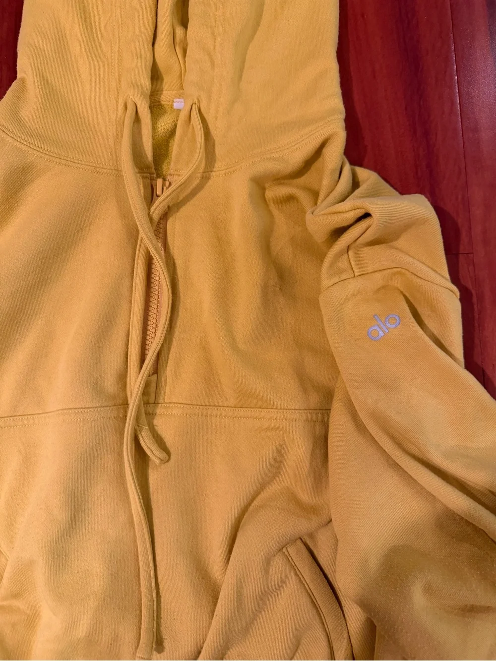 Alo Yoga Stadium Half Zip in Sulphur